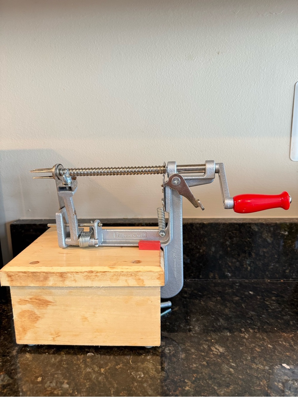 The Pampered Chef Apple Peeler Corer Slicer with Red Handle